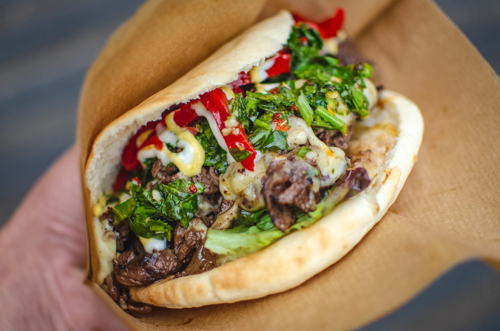 argentine inspired steak sandwich with chimichurri and cheese